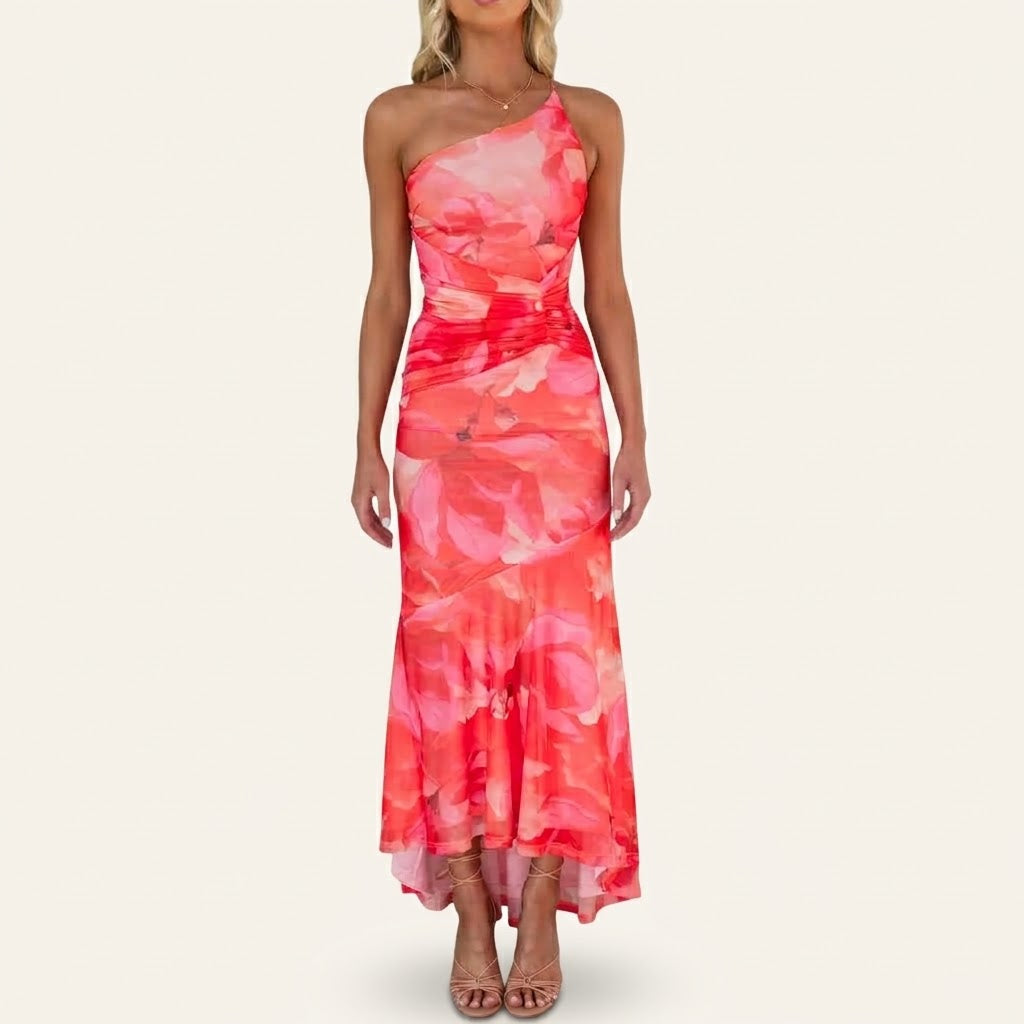 Woman wearing Drapelia floral one-shoulder maxi dress with botanical print