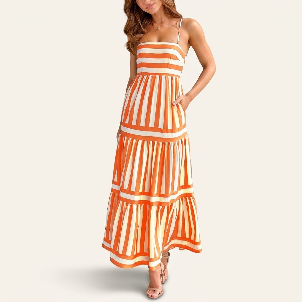 Woman wearing Drapelia striped square neck maxi dress with pockets