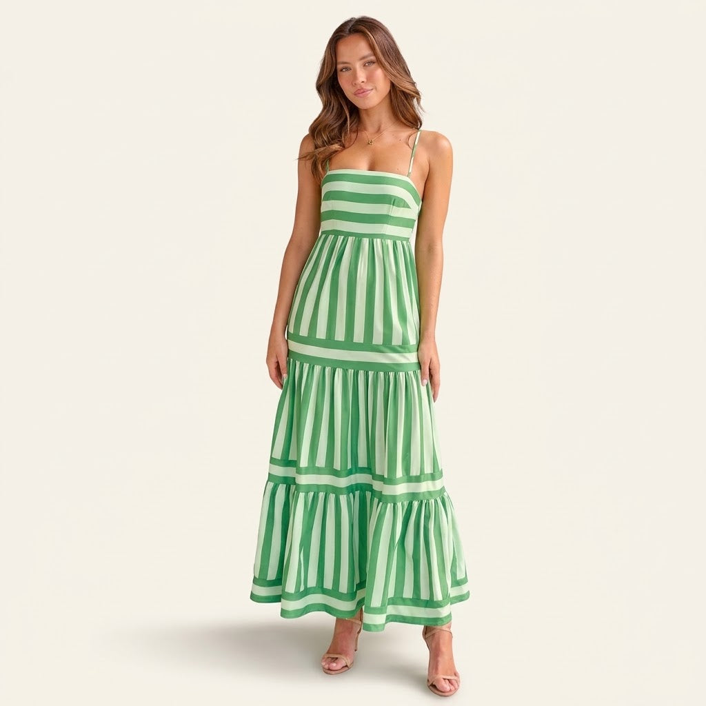 Woman wearing Drapelia striped square neck maxi dress with pockets