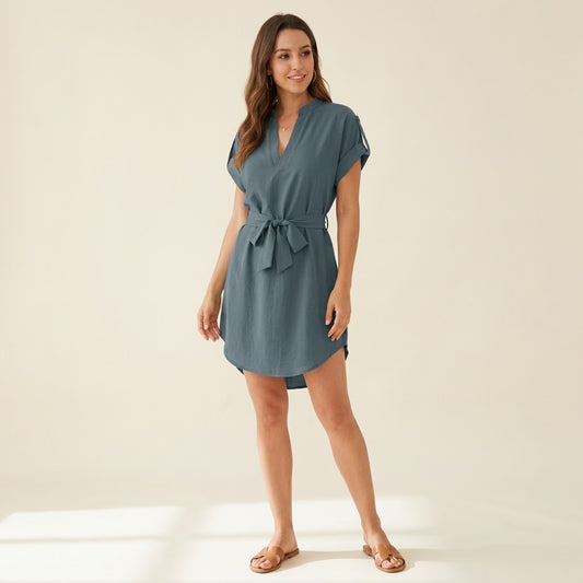 Woman wearing Drapelia V-neck short sleeve dress with bow belt