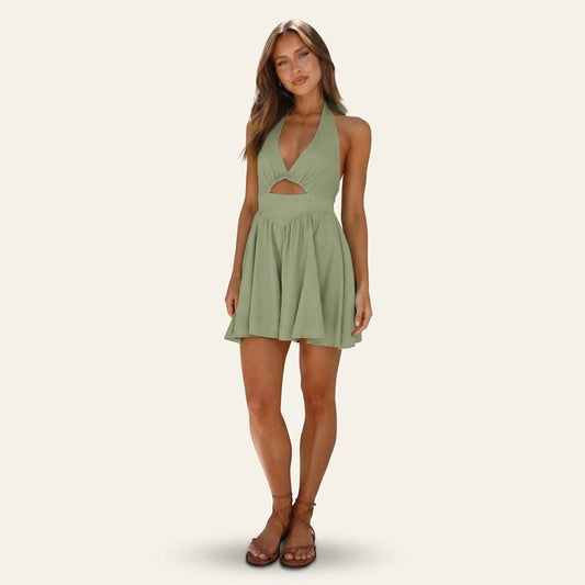Woman wearing Drapelia halter backless mini sundress with cutout detail