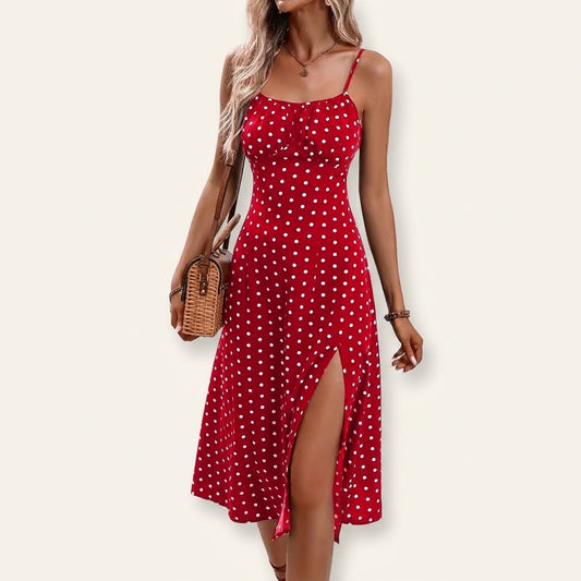 Woman wearing Drapelia polka dot slip maxi dress with side slit