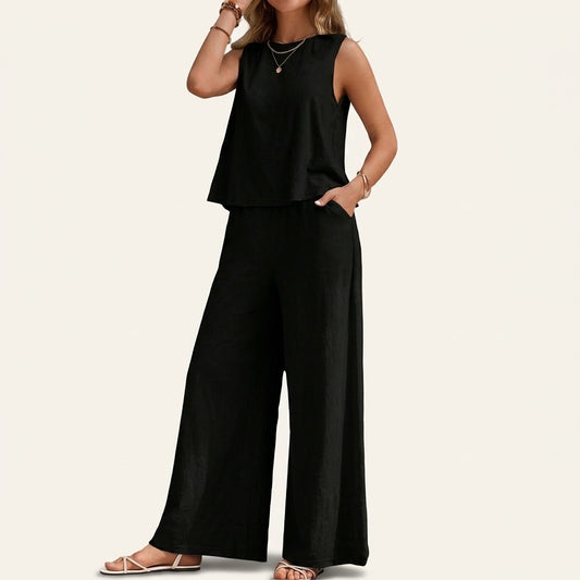 Woman wearing Drapelia sleeveless top and wide pants set in a solid color