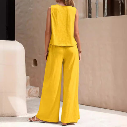Woman wearing Drapelia sleeveless top and wide pants set in a solid color