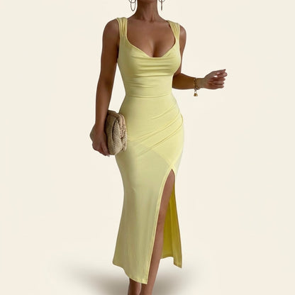 Woman wearing Drapelia slim sleeveless backless slit dress with back tie