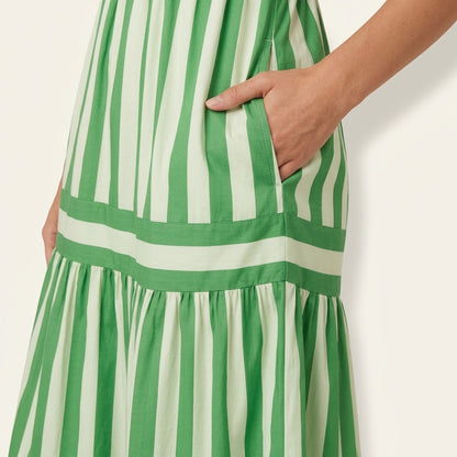 Woman wearing Drapelia striped square neck maxi dress with pockets