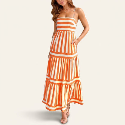 Woman wearing Drapelia striped square neck maxi dress with pockets
